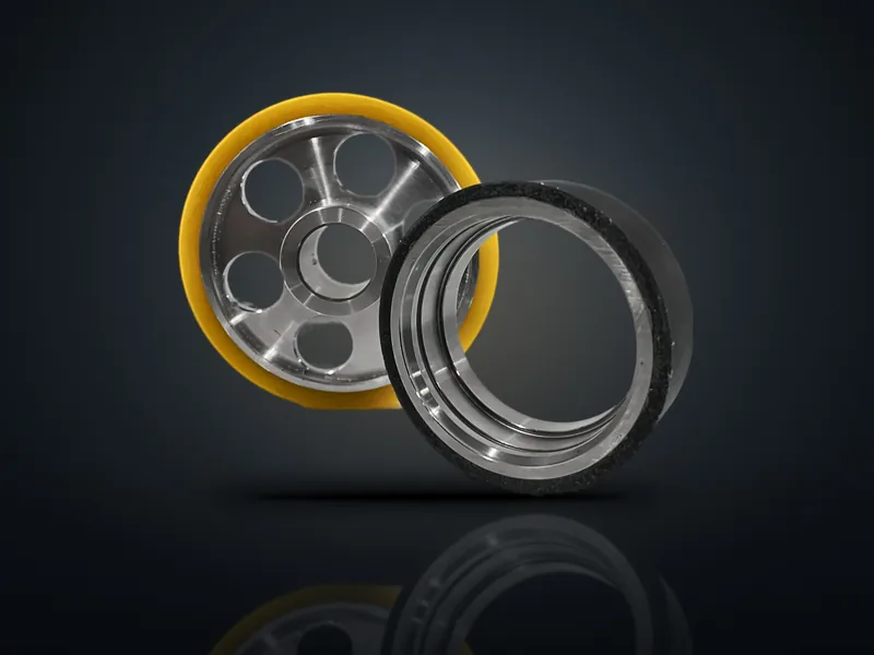 Gelb beschichtete Rolle und Ring mit schwarzer Beschichtung auf Aluminiumkern